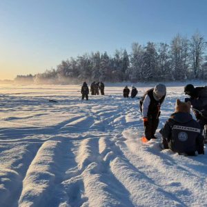 Lappish Day: Snowshoeing, Ice Fishing, Snowmobile+Grilled Salmon