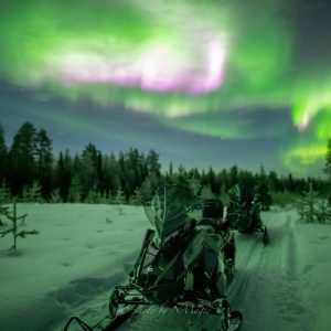 Hunting Aurora with Snowmobile