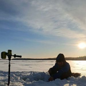 Ice Fishing by Snowmobile Sleigh